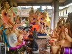 Artisans give final touches to idols of Lord Ganesha ahead of the upcoming festival of 'Ganesh Chaturthi'.(PTI) Artisans give final touches to idols of Lord Ganesha ahead of the upcoming festival of 'Ganesh Chaturthi'.(PTI)