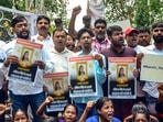 Activists of Jharkhand Youth Bigrade raise slogans during a protest after the death of a teenager, who was allegedly set on fire by a man in Jharkhand's Dumka district, in Ranchi. (PTI Photo) Activists of Jharkhand Youth Bigrade raise slogans during a protest after the death of a teenager, who was allegedly set on fire by a man in Jharkhand's Dumka district, in Ranchi. (PTI Photo)