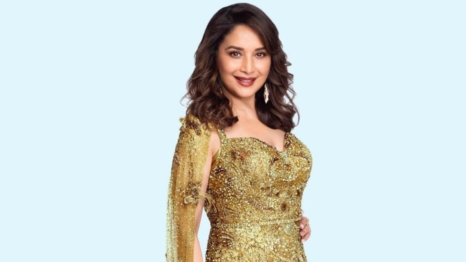 Madhuri Dixit’s golden girl look for Jhalak Dikhhla Jaa in thigh-slit gown makes fans say ‘beautiful queen’. See pics | Fashion Trends