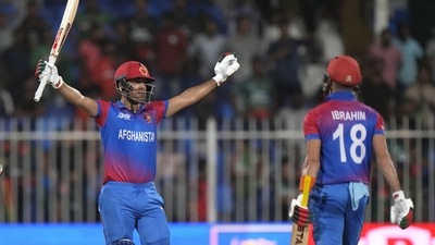 Afghanistan's Najibullah Zadran, left, celebrate after hitting wining boundary during the T20 Asia Cup (AP) Afghanistan's Najibullah Zadran, left, celebrate after hitting wining boundary during the T20 Asia Cup (AP)