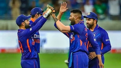 India's Hardik Pandya celebrates with teammate Dinesh Karthik after a wicket during the Asia Cup 2022 cricket match between India and Pakistan, at Dubai International Cricket Stadium, UAE. India won by 5 wickets. (PTI) India's Hardik Pandya celebrates with teammate Dinesh Karthik after a wicket during the Asia Cup 2022 cricket match between India and Pakistan, at Dubai International Cricket Stadium, UAE. India won by 5 wickets. (PTI)