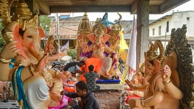 Artisans give final touches to idols of Lord Ganesha ahead of the upcoming festival of 'Ganesh Chaturthi'. (PTI) Artisans give final touches to idols of Lord Ganesha ahead of the upcoming festival of 'Ganesh Chaturthi'. (PTI)