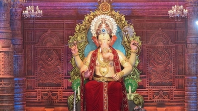 The Lalbaugcha Raja Sarvajanik Ganeshotsav Mandal witnessed a huge crowd on Monday to see the unveiling of the idol. (PTI) The Lalbaugcha Raja Sarvajanik Ganeshotsav Mandal witnessed a huge crowd on Monday to see the unveiling of the idol. (PTI)
