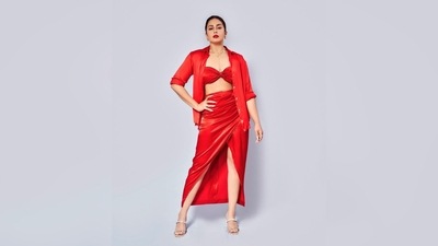 Huma Qureshi completed her look by teaming it with a red oversized shirt from Zara. (Instagram/@iamhumaq) Huma Qureshi completed her look by teaming it with a red oversized shirt from Zara. (Instagram/@iamhumaq)
