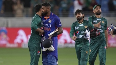 India's Hardik Pandya, second left, hugs Pakistan's Shadab Khan after India won the T20 cricket match of Asia Cup against Pakistan, in Dubai, United Arab Emirates, Sunday, Aug. 28, 2022. (AP) India's Hardik Pandya, second left, hugs Pakistan's Shadab Khan after India won the T20 cricket match of Asia Cup against Pakistan, in Dubai, United Arab Emirates, Sunday, Aug. 28, 2022. (AP)