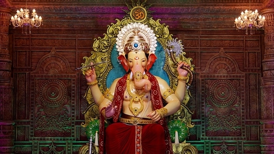 The first look of the 14-foot-tall idol of Lord Ganesha is unveiled by the Lalbaugcha Raja Sarvajanik Ganeshotsav Mandal, two days before the beginning festival, in Mumbai on Monday.(ANI)
