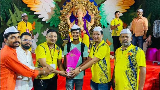 The mandal, which welcomed a six-foot idol draped in a yellow dhoti with much fanfare on Tuesday decided to bring in the Ganesh festival this year with something extra (HT Photo)