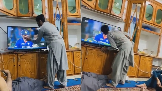 An Afghanistan cricket fan kisses Hardik Pandya through the TV screen(Twitter)
