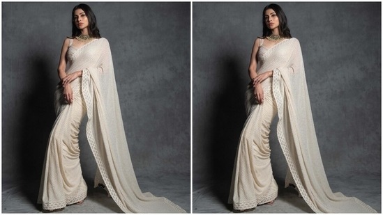 On Tuesday, Mouni took to Instagram to drop pictures from a new photoshoot with a white heart as a caption. The Brahmastra actor's traditional look is from the shelves of designer Sawan Gandhi's clothing label. It features an ivory saree and a stylish blouse to complement the six yards.(Instagram)