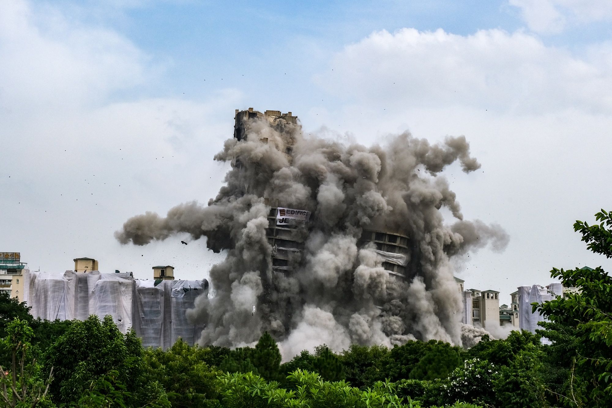 The twin towers of Supertech Ltd. during the demolition in Noida, India, on Sunday, August 28, 2022. (Photographer: T. Narayan/Bloomberg) The twin towers of Supertech Ltd. during the demolition in Noida, India, on Sunday, August 28, 2022. (Photographer: T. Narayan/Bloomberg)