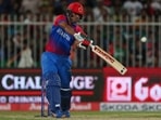 Afghanistan's Najibullah Zadran plays a shot during the Asia Cup Twenty20 international cricket Group B match against Bangladesh at the Sharjah Cricket Stadium in Sharjah