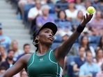 Venus Williams of the United States serves against Alison Van Uytvanck of Belgium on day two of the 2022 U.S. Open