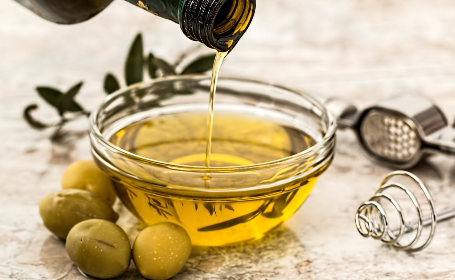 Olive oil for hair: It promotes hair growth and smoothens strands