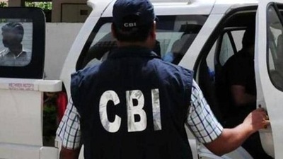 CBI officials took AAP’s chief whip in Delhi Assembly Dilip K Pandey and Kalkaji MLA Atishi inside the agency premises to lodge their complaint. (File) CBI officials took AAP’s chief whip in Delhi Assembly Dilip K Pandey and Kalkaji MLA Atishi inside the agency premises to lodge their complaint. (File)
