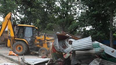 Lucknow municipal corporation removed encroachment outside Samajwadi party office. (HT Photo)