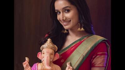 Actor Shraddha Kapoor at her Mumbai house, posing exclusively for HT City with her favourite Bappa. (Photo: Satish Bate/ HT) Actor Shraddha Kapoor at her Mumbai house, posing exclusively for HT City with her favourite Bappa. (Photo: Satish Bate/ HT)