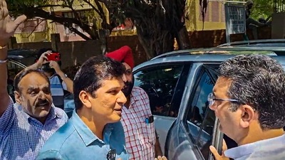 AAP MLA Saurabh Bharadwaj speaks with BJP spokesperson Gaurav Bhatia outside a Delhi government-run school in New Delhi. (PTI) AAP MLA Saurabh Bharadwaj speaks with BJP spokesperson Gaurav Bhatia outside a Delhi government-run school in New Delhi. (PTI)