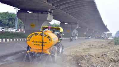 Water being sprinkled on directions of NHAI authorities on Ferozepur road due to dust caused by ongoing elevated road construction project in Ludhiana. (Gurpreet Singh/HT) Water being sprinkled on directions of NHAI authorities on Ferozepur road due to dust caused by ongoing elevated road construction project in Ludhiana. (Gurpreet Singh/HT)