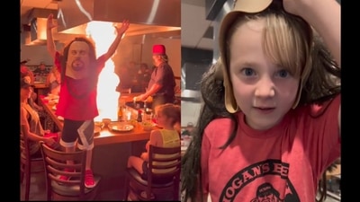 The image shows kid mimicing The Undertaker's famous move in the restaurant. (Instagram/@ro_knows_wrestling) The image shows kid mimicing The Undertaker's famous move in the restaurant. (Instagram/@ro_knows_wrestling)