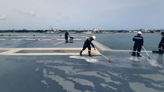 Deck scrub on board aircraft carrier Vikrant.&nbsp;(Rahul Singh/HT File Photo)
