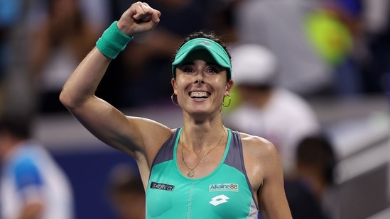 Alize Cornet of France celebrates defeating Emma Raducanu of Great Britain in their Women's Singles First Round match on Day Two of the 2022 US Open.(AFP)