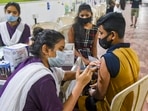 A beneficiary receiving a dose of Covid-19 vaccine from a healthworker. (FILE PHOTO)