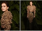 Dia Mirza believes in sustainable fashion and is often seen promoting brands that empower craftsmen from across the country. For a recent photoshoot, the Rehna Hain Tere Dil Mein actor went all out and opted for a 3D hand embroidered tree of life gown from designer Rahul Mishra's clothing sustainable couture.(Instagram/@diamirza)