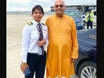 The image shows Vedanta chairman Anil Agarwal&nbsp;with a former employee who is now a pilot.