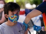 Even as modified shots roll out, Moderna and Pfizer are conducting human studies to help assess the updated vaccine's value.