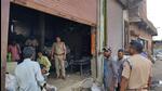 Police personnel check a godown of a scrap dealer under a special drive in Udham Singh Nagar to confirm if they have any hazardous material (HT Photo)