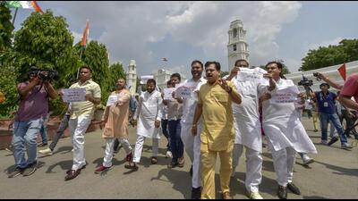 AAP lawmakers outside the Delhi assembly. (PTI) AAP lawmakers outside the Delhi assembly. (PTI)