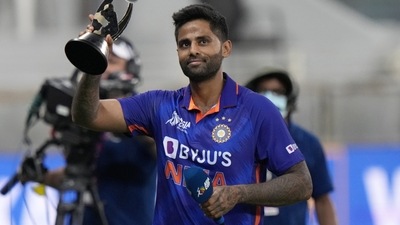 India's Suryakumar Yadav raises his trophy after receiving man of the match award (AP)