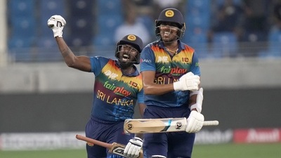 Sri Lanka Asitha Fernando, left, celebrates with teammate Maheesh Theekshana (AP) Sri Lanka Asitha Fernando, left, celebrates with teammate Maheesh Theekshana (AP)