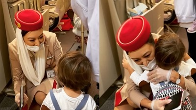 The image, taken from the viral video, shows a sweet interaction between an Emirates air hostess and her toddler son. (Instagram/@flygirl_trigirl) The image, taken from the viral video, shows a sweet interaction between an Emirates air hostess and her toddler son. (Instagram/@flygirl_trigirl)