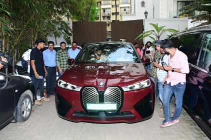 Paparazzi clicking pics of Riteish and Genelia's new car. (Pic: Varinder Chawla)