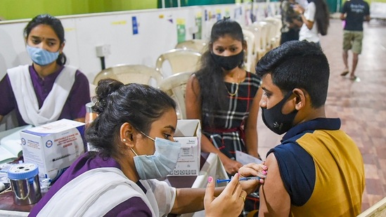 A beneficiary receiving a dose of Covid-19 vaccine from a healthworker. (FILE PHOTO)
