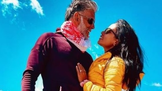 Milind Soman and Ankita Konwar pose together.