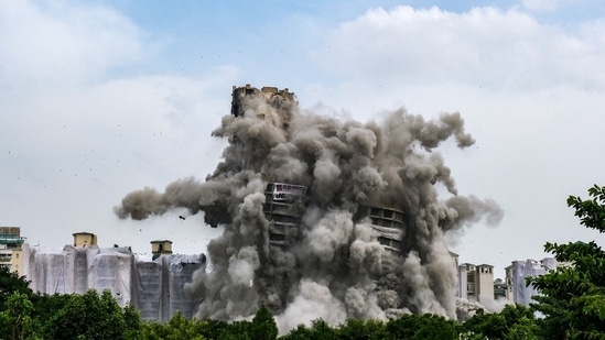 The twin towers of Supertech Ltd. during the demolition in Noida, India, on Sunday, August 28, 2022. (Photographer: T. Narayan/Bloomberg) The twin towers of Supertech Ltd. during the demolition in Noida, India, on Sunday, August 28, 2022. (Photographer: T. Narayan/Bloomberg)