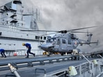 Navy helicopter takes off from the flight deck of INS Vikrant.(PTI)