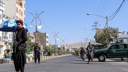 Taliban fighters stand guard at a checkpoint in Herat  (File image)