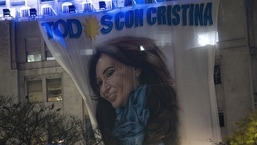A flag with a portrait of Argentina's Vice President Cristina Fernandez hangs on a government building early Friday, Sept. 2, 2022 (AP Photo/Rodrigo Abd)