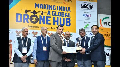 UP STF ADG Amitabh Yash and DSP Deepak Kumar Singh accepting the award in New Delhi on Friday (HT Photo)