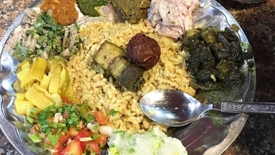 Jadoh (Meghalaya): In the local Khasi language, ‘ja’ means rice and ‘doh’ means meat. This is a traditional dish of the Khasi tribe of Meghalaya and is prepared on special occasions. This is the state's very own biryani prepared with minimal spices and oil. Another version which is popular among the locals is 'Jadoh Snam' which is rice cooked with chicken or pork blood. (Chayanika Das)
