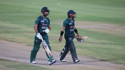 Mohammad Rizwan (R) and his teammate Khushdil Shah leave the field after Pakistan's innings during Asia Cup match against Hong Kong at the Sharjah Cricket Stadium (AFP) Mohammad Rizwan (R) and his teammate Khushdil Shah leave the field after Pakistan's innings during Asia Cup match against Hong Kong at the Sharjah Cricket Stadium (AFP)