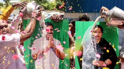 Supporters of AIADMK leader Edappadi K. Palaniswami celebrate after a court delivered its verdict in favour of the former chief minister on the conduct of July 11 General Council (GC) meeting of AIADMK, in Chennai. (PTI)