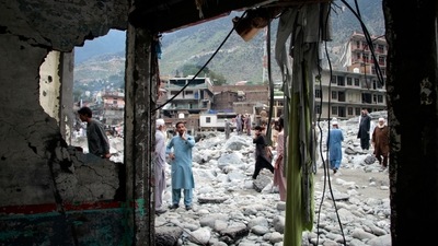 Pakistan flood fury:; People salvage usable items from a damaged hotel after flooding in the town of Bahrain, Pakistan, (AP) Pakistan flood fury:; People salvage usable items from a damaged hotel after flooding in the town of Bahrain, Pakistan, (AP)