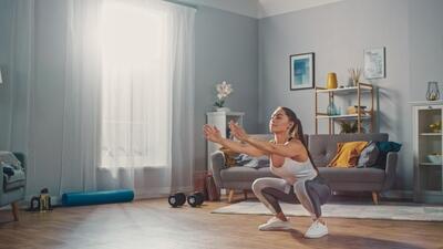 Bodyweight squats is part of a minimalistic training program which anybody can do in their home (Shutterstock) Bodyweight squats is part of a minimalistic training program which anybody can do in their home (Shutterstock)