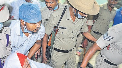 Chitradurga: Chief pontiff of Murugha Math Shivamurthy Murugha Sharanarubeing taken to hospital for health check up, in Chitradurga, Friday, Sept. 2, 2022. Sharanaru, who has been arrested for alleged sexual abuse of two minor girls and sent to judicial custody, will be shifted to Bengaluru after developing some health complications in jail. (PTI) Chitradurga: Chief pontiff of Murugha Math Shivamurthy Murugha Sharanarubeing taken to hospital for health check up, in Chitradurga, Friday, Sept. 2, 2022. Sharanaru, who has been arrested for alleged sexual abuse of two minor girls and sent to judicial custody, will be shifted to Bengaluru after developing some health complications in jail. (PTI)