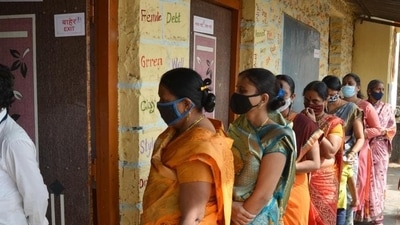 Voters at the polling booth at Kadegaon, Sangli, 2021 (PTI) Voters at the polling booth at Kadegaon, Sangli, 2021 (PTI)