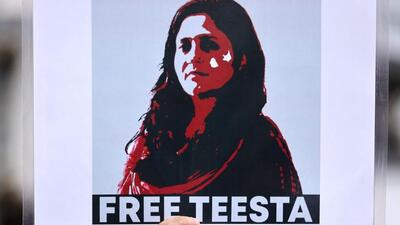 A protestor holds a placard demanding the release of activist Teesta Setalvad after she was arrested at her home by the anti-terrorism wing of the Gujarat police during a protest in Mumbai (Reuters File Photo) A protestor holds a placard demanding the release of activist Teesta Setalvad after she was arrested at her home by the anti-terrorism wing of the Gujarat police during a protest in Mumbai (Reuters File Photo)